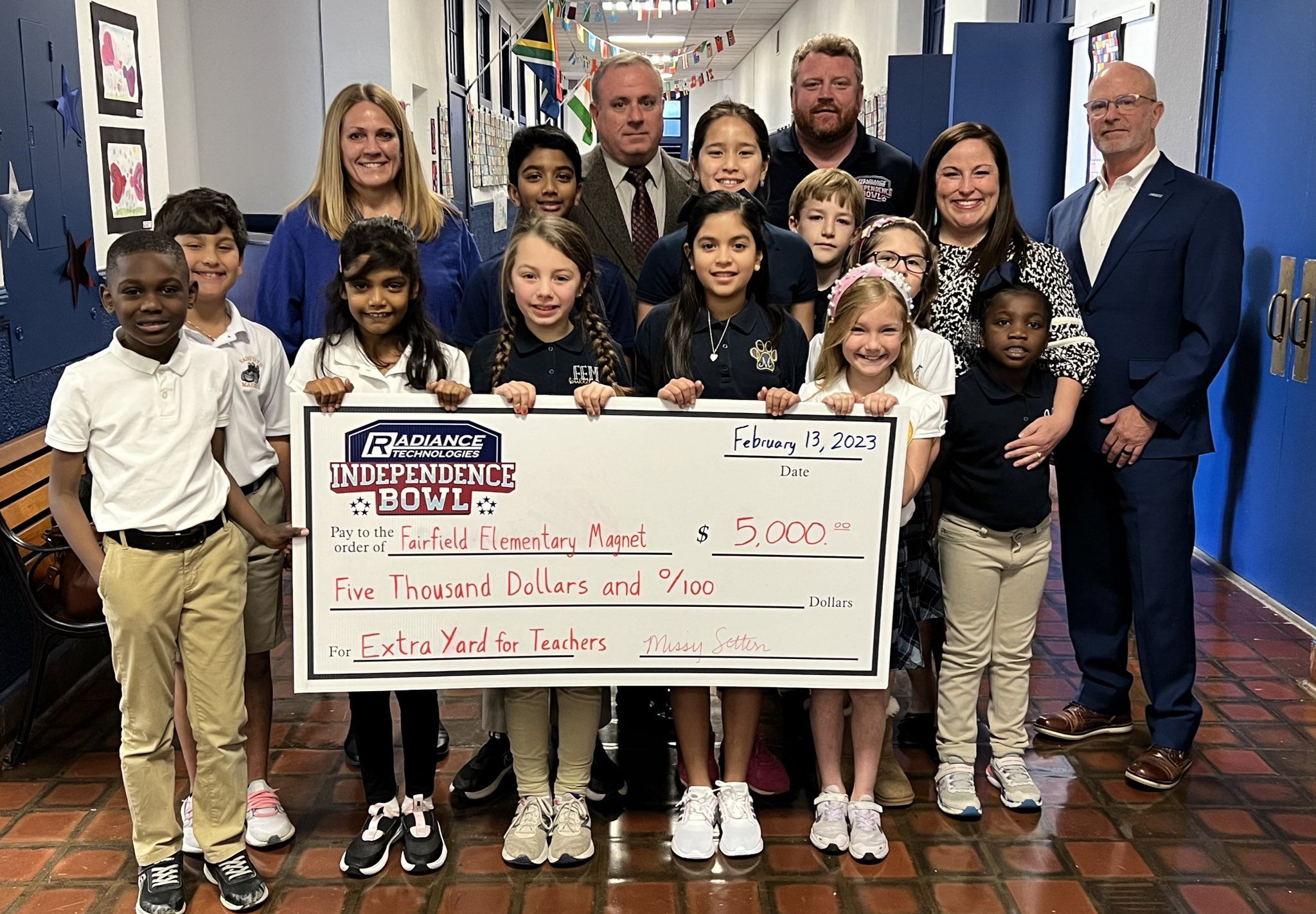 Independence Bowl Presents 5,000 Checks to Fairfield Elementary